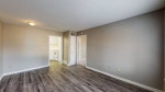 Spacious living area of a 1-bedroom apartment with updated floors and central air in Memphis.