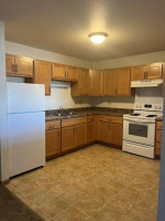 Spacious kitchen in a 1-bedroom apartment at Thousand Oaks, Arcadia, featuring modern appliances and ample storage.