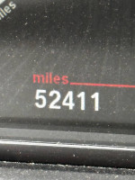 Odometer reading showing 52,411 miles for a 2016 BMW 5 Series in excellent condition.