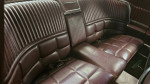 Interior view of a 1966 Ford Thunderbird showing plush leather seating and vintage design.