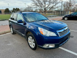 2011 Subaru Outback in blue, parked with clean exterior and modern design, ideal for all-wheel drive enthusiasts.