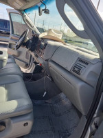 Interior view of a 2005 Ford F-250 Diesel Lariat with low mileage and clean condition.
