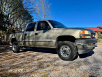 2001 GMC Sierra 2500HD crew cab truck, 150k miles, rust-free, automatic transmission, parked in nature