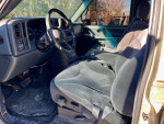 Interior view of a 2001 GMC Sierra 2500HD showing clean seats and dashboard, low mileage, ready for trade or sale.