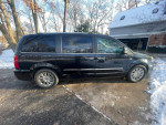 2014 Chrysler Town & Country minivan in great condition, black exterior, well maintained with entertainment package.