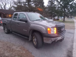 2012 GMC Sierra 4x4 Xtra cab truck with 58,600 miles, showcasing its mechanical condition and features.