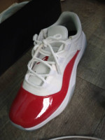 Red and white Jordan low top 11s Mens size 9/1/2