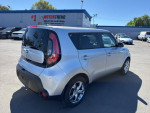 2015 Kia Soul wagon in bright silver with gray interior, featuring 64,127 miles and 164 hp.