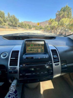 Interior view of a 2005 Toyota Prius showcasing dashboard and control panel features