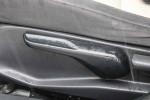 Detail view of seat adjustment controls in a 2018 Honda Civic EX Hatchback interior