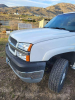 2003 Chevrolet Silverado 2500HD Crew Cab 4WD, white truck with off-road tires, good condition, 221,000 miles