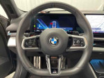 Interior view showcasing the steering wheel and dashboard of a 2017 BMW 6 Series 640i xDrive