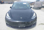 Front view of a 2020 Tesla Model 3 Standard Range Plus in black with 49,256 miles, electric sedan design.