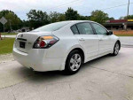2008 Nissan Altima 2.5 sedan with leather seats, low mileage, and clean title, ready for financing and shipping.