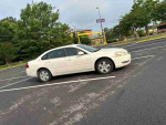 2012 Chevrolet Impala LS parked, reliable full-size sedan with 182,357 miles for sale at $3,400.