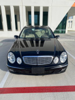 Front view of a well-maintained 2004 Mercedes-Benz E320 in excellent condition, with 69,727 original miles.