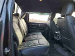 Interior view of a 2021 Ram 1500 Classic Express showing spacious back seating.