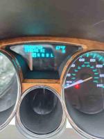 2012 Buick Enclave odometer showing 195,645 miles and dashboard details for a 7 passenger SUV.
