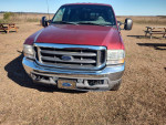 Front view of a 2003 Ford F350 diesel truck with great exterior, heated leather seats, and 167,000 miles.