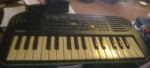 CASIO SA-46 Mini Keyboard Black & Green 32 Keys 100 Tones 50 Patterns