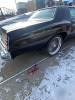 1977 Monte Carlo classic car for sale, showcasing recently painted exterior and wire wheels.