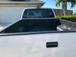 Rear view of a 2000 Chevrolet S-10 LS 4WD truck bed, showcasing good condition and clean exterior.