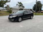 2010 Lincoln MKT with low mileage, featuring a sleek design and spacious interior in good condition