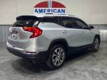 2018 GMC Terrain SLT FWD in silver, showcasing sleek design and modern features, ideal for urban driving.