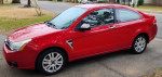 2008 Ford Focus 2-door SE in Vermillion Red, low mileage and excellent condition, perfect for daily commuting.