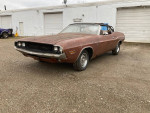 1970 Dodge Challenger convertible in need of full restoration with a rusted body and matching numbers engine.