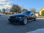 1999 BMW Z3 M Coupe in Boston Green Metallic with Oregon Beige interior parked outdoors.