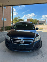 Front view of a 2011 Volkswagen Tiguan in good condition with new tires and parts