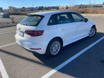 2016 Audi A3 E-Tron in pristine condition, parked with new tires and winter package, perfect for eco-friendly driving.