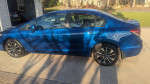 Side view of a blue 2013 Honda Civic EX FWD parked, showcasing its design and new tires.