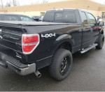 2011 Ford F150 XLT 4x4 with low mileage and clean interior, featuring running boards and bed cover.