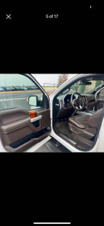 Interior view of a 2017 Ford F150 King Ranch Supercab 4x4 showcasing luxury features and clean design.