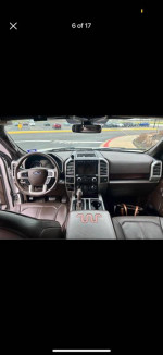 Interior view of a 2017 Ford F150 King Ranch Supercab 4x4 with a luxurious leather finish