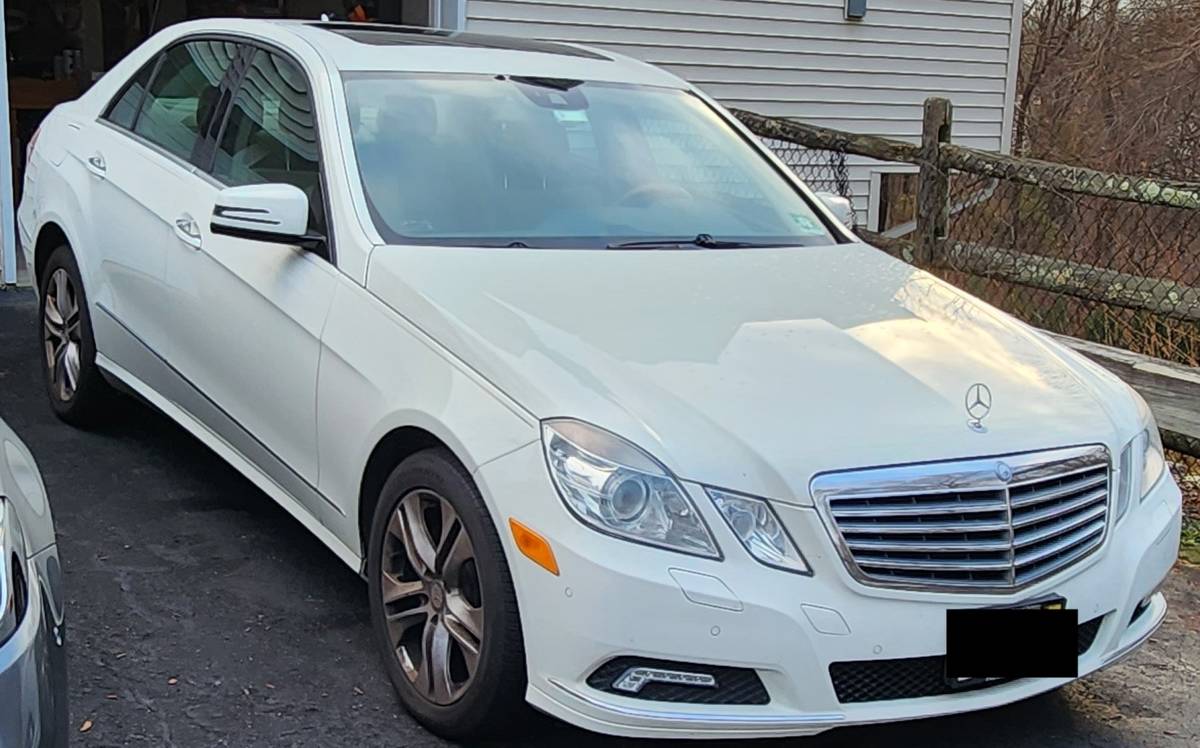 2010 Mercedes-Benz E-Class E350 luxury sedan in white with 139,000 miles, showcasing elegant design and premium features.