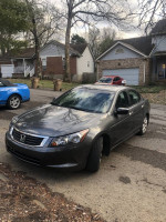 2008 Honda Accord in gray color parked on the street, showcasing excellent condition and 93,000 miles.
