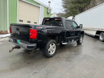 2015 Chevrolet Silverado 1500 LTZ 4WD with Z71 package, showing rear view and new tires.