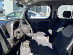 Interior view of a 2010 Nissan Cube SL with comfortable seating and modern dashboard features