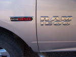 Close-up of the ECO Diesel logo on a 2015 Ram 1500 truck, showcasing its engine performance feature.