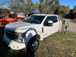 2022 Ford F350 Super Duty Crew Cab with custom aluminum bed and utility boxes for tools, low mileage, and well maintained