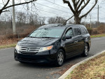 2013 Honda Odyssey EX FWD in excellent condition with leather interior and low mileage for sale.
