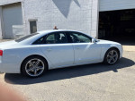 2013 Audi A8 luxury sedan in excellent condition with S8 appearance package and all-wheel drive, white exterior.