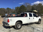 2016 Ford F-250 XL 4x4 Crew Cab pickup truck viewed from the side in a work environment