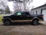 2011 Ford F-150 4x4 SuperCrew in good condition, available for sale with minor rust and one owner.