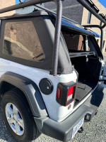2020 Jeep Wrangler rear view with roof rack and upgraded features, ready for outdoor adventures.
