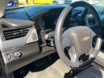 Interior view of a 2017 Chevy Tahoe LT with well-maintained dashboard and steering wheel.