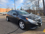 2011 Hyundai Sonata GLS FWD in black, well-maintained with clean interior and new Bluetooth radio.